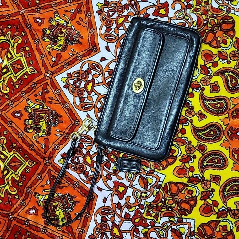 Coach black leather wristlet.